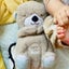 Baby Bear Otter Plush Toy Soothing Music Sleep Companion with Sound and Light Carousel 4