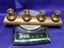 Brass candle holders hold 4 candles 800G Carousel 16