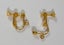 A PAIR of GOLD SCREW-ON EARRINGS Carousel 1
