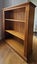 Solid wooden bookshelf with adjustable shelves. Carousel 6