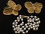 Vintage Monet Butterflies and faux pearl bracelet used as Cardigan Clip Carousel 1