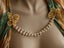 Vintage Monet Butterflies and faux pearl bracelet used as Cardigan Clip Carousel 5