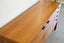 A ROSEWOOD MID-CENTURY SIDEBOARD BY MEREDEW U.K Carousel 12