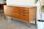 A ROSEWOOD MID-CENTURY SIDEBOARD BY MEREDEW U.K Carousel 13