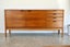 A ROSEWOOD MID-CENTURY SIDEBOARD BY MEREDEW U.K Carousel 17