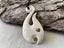 Hand-Carved Bone Fish Hook Pendant with Paua Shell Inlay Carousel 1