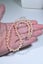 pearl necklace peach pink overtones Carousel 7