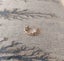 Pretty daisy chain light metal toe ring. Carousel 1