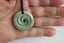 BEAUTIFUL New Zealand**INANGA FLOWER ** POUNAMU KORU #220 Carousel 1