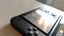 Modded Silver Nintendo 3DS XL with SD card mod Carousel 9