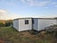 Living, 4 Bed, 2 Bath Relocatable cabins with covered deck Carousel 6