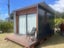 Tidy Cabin with heatpump, deck, lighting and power Carousel 9