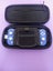 Blue Nintendo switch lite with glow-in-the-dark carry case Carousel 2