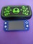 Blue Nintendo switch lite with glow-in-the-dark carry case Carousel 1