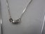 White Gold and Diamond Necklace Carousel 4