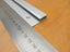 Alloy trim for laminate flooring. Carousel 3