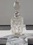 Antique/vintage crystal perfume bottle with stopper and hallmarked silver cuff. Carousel 3