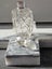 Antique/vintage crystal perfume bottle with stopper and hallmarked silver cuff. Carousel 6