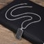 Men's Titanium Steel Dog Tag Chain with Iced Out Detailing Carousel 1
