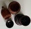 Carved Matai acorn & bakelite needle holders plus thimbles Carousel 6