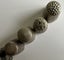 Carved Matai acorn & bakelite needle holders plus thimbles Carousel 14