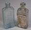 Two Dunedin Otago Chemist Bottles - One Rare Labeled Quack Cure Carousel 1