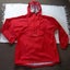 Kathmandu size 12 years red rain jacket, waterproof. Carousel 1