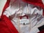 Kathmandu size 12 years red rain jacket, waterproof. Carousel 2