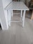 White trestle desk 1400L x 600W Carousel 4