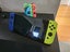 Nintendo Switch OLED + 8 games and accessories and extra joy cons Carousel 1