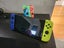 Nintendo Switch OLED + 8 games and accessories and extra joy cons Carousel 4