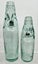 2 x Thomson & Co Dunedin codd coloured marble bottles Carousel 2
