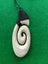 Medium Bone Carving Koru Pendant in Giftbox Carousel 1