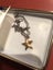 9 Ct star pendant on a sterling silver chain . Carousel 3