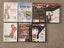 Bulk Assorted DVD's, Blu-ray, and PC games Carousel 3