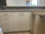 Kitchen used- cabinets, countertops, sink (oven and dishwasher optional) Carousel 6