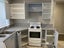 Kitchen used- cabinets, countertops, sink (oven and dishwasher optional) Carousel 8