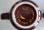 Two Crown Lynn 1160 coffee mugs - one marked 'A' on bottom Carousel 10