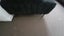 Gorgeous large black fake fur fabric ottoman with chrome feet. Carousel 3