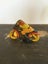 A PAIR OF EARLY TIN PLATE KEY WOUND TOYS ONE LINCOLN TOYS Carousel 5