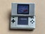 Silver Original Nintendo DS + R4 Cartridge Carousel 13