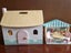 Wooden doll house and a cafe with dolls and accessories Carousel 3
