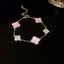 Four-Leaf pink Clover-Inspired Charm Bracelet in Gold Tone Carousel 3