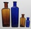 4 x Edson Auckland coloured glass chemist bottles Carousel 1