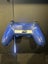PS4 with a controller Carousel 4