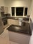 Kitchen - bench top cupboards oven sink Carousel 1