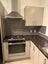 Kitchen - bench top cupboards oven sink Carousel 2