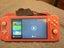 Nintendo switch lite with Pokemon case Carousel 2
