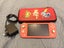Nintendo switch lite with Pokemon case Carousel 1
