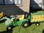 Sit on John Deere tractor and trailers Carousel 1